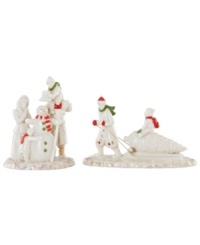 Mistletoe Park villagers revel in the spirit of the holidays, building snowmen and pulling home trees in two beautiful porcelain figurines accented with gold and Christmas-color detail. From Lenox. Mistletoe Park villagers revel in the spirit of the holidays, building snowmen and pulling home trees in two beautiful porcelain figurines accented with gold and Christmas-color detail. From Lenox.