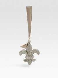 A majestic Fleur de Lis in sparkling glass glitter, accented with delicate beads and suspended from a luxe ribbon loop.Satin ribbon loopGlass glitterBeaded trim4 X 3.5 X 1Handmade in USA A majestic Fleur de Lis in sparkling glass glitter, accented with delicate beads and suspended from a luxe ribbon loop.Satin ribbon loopGlass glitterBeaded trim4 X 3.5 X 1Handmade in USA