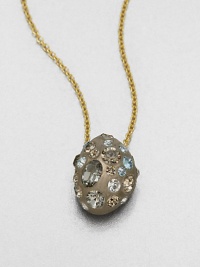 From the Lucite Modulor Collection. A graceful oval bean of hand-painted, hand-sculpted lucite is embedded with Swarovski crystals and sapphire-tinted glass in this lovely pendant on a golden chain.Crystal and glassLuciteGoldtoneChain length, about 16 plus 3 extenderLobster claspMade in USA From the Lucite Modulor Collection. A graceful oval bean of hand-painted, hand-sculpted lucite is embedded with Swarovski crystals and sapphire-tinted glass in this lovely pendant on a golden chain.Crystal and glassLuciteGoldtoneChain length, about 16 plus 3 extenderLobster claspMade in USA
