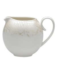 A soft, feminine look with Denby durability, the Lucille Gold creamer promises lasting style and modern grace. In a pattern inspired by vintage lace and designed by English stylemaker, Monsoon, shimmering gold swirls adorn creamy porcelain in this set of dinnerware. The dishes are beautiful for every day and occasion. A soft, feminine look with Denby durability, the Lucille Gold creamer promises lasting style and modern grace. In a pattern inspired by vintage lace and designed by English stylemaker, Monsoon, shimmering gold swirls adorn creamy porcelain in this set of dinnerware. The dishes are beautiful for every day and occasion.