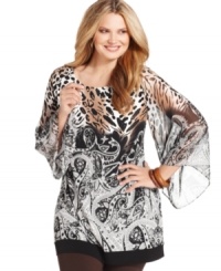 Style&co. masterfully blends paisley and animal prints with this plus size tunic top-- finish the look with leggings! Style&co. masterfully blends paisley and animal prints with this plus size tunic top-- finish the look with leggings!