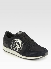Make a remarkably bold style statement in this eye-catching lace-up, constructed in a smooth combination of suede and nylon with signature logo detail.Suede/nylon upperPadded insoleRubber soleImported Make a remarkably bold style statement in this eye-catching lace-up, constructed in a smooth combination of suede and nylon with signature logo detail.Suede/nylon upperPadded insoleRubber soleImported