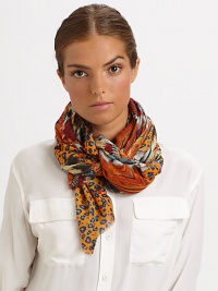 A lightweight cashmere and silk blend wrap is adorned with a vivid, tribal-inspired print and eyelash trim.55% cashmere/45% silk28 X 80Dry cleanImported A lightweight cashmere and silk blend wrap is adorned with a vivid, tribal-inspired print and eyelash trim.55% cashmere/45% silk28 X 80Dry cleanImported