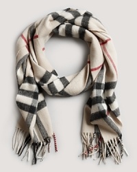 Stay warm in style with this luxe cashmere scarf from Burberry. Stay warm in style with this luxe cashmere scarf from Burberry.
