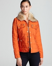 Channel utilitarian chic in a quilted MICHAEL Michael Kors jacket, featuring a plush fur-lined hood and gold-tone hardware for a luxe approach to cold-weather style. Channel utilitarian chic in a quilted MICHAEL Michael Kors jacket, featuring a plush fur-lined hood and gold-tone hardware for a luxe approach to cold-weather style.