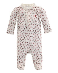 Finished with pretty lace accents, an adorable coverall is crafted in ultra-soft floral pointelle jersey. Finished with pretty lace accents, an adorable coverall is crafted in ultra-soft floral pointelle jersey.