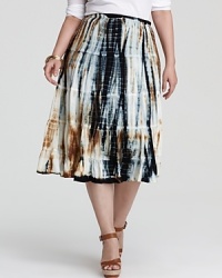 Work the tribal trend into your daily rotation with a tie-dye Karen Kane Plus skirt. Play up the exotic sentiment with leather sandals and an armful of bangles. Work the tribal trend into your daily rotation with a tie-dye Karen Kane Plus skirt. Play up the exotic sentiment with leather sandals and an armful of bangles.