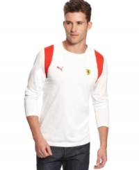 Sport and luxury seamlessly cross paths with this long-sleeved Ferarri shirt from Puma. Sport and luxury seamlessly cross paths with this long-sleeved Ferarri shirt from Puma.