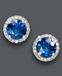 Studs add simple, yet spectacular, definition to your look. Effy Collection's chic design highlights round-cut sapphires (2 ct. t.w.) encircled by round-cut diamonds (1/5 ct. t.w.). Crafted in 14k white gold. Approximate diameter: 1/3 inch. Studs add simple, yet spectacular, definition to your look. Effy Collection's chic design highlights round-cut sapphires (2 ct. t.w.) encircled by round-cut diamonds (1/5 ct. t.w.). Crafted in 14k white gold. Approximate diameter: 1/3 inch.