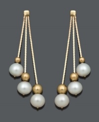 The best of both worlds -- these Belle de Mer earrings combine traditional pearls with bold style. Set in 14k gold, three graduated drops feature cultured freshwater pearls (6-7 mm) and gold bead accents. Approximate drop: 1-3/4 inches. The best of both worlds -- these Belle de Mer earrings combine traditional pearls with bold style. Set in 14k gold, three graduated drops feature cultured freshwater pearls (6-7 mm) and gold bead accents. Approximate drop: 1-3/4 inches.