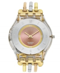 A harmonious blend of warm tones create a lovely effect on this elegant Tri-Gold collection Swatch watch. A harmonious blend of warm tones create a lovely effect on this elegant Tri-Gold collection Swatch watch.