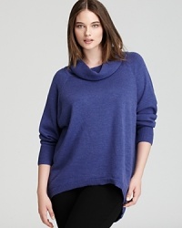 Ushering in a season of separates, this Eileen Fisher Plus sweater makes a bold statement with a swingy silhouette and an oversized funnel neckline.