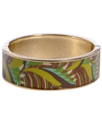 Channel the exoticism and energy of Brasil in Haskell's inspired skinny bangle. The Palm bangle features a brown and green palm leaf print design, set in gold tone mixed metal with a hinge clasp. Approximate diameter: 2-1/2 inches. Approximate length: 8 inches. Item comes packaged in a green gift box. Channel the exoticism and energy of Brasil in Haskell's inspired skinny bangle. The Palm bangle features a brown and green palm leaf print design, set in gold tone mixed metal with a hinge clasp. Approximate diameter: 2-1/2 inches. Approximate length: 8 inches. Item comes packaged in a green gift box.