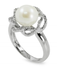 Beauty is in full bloom. This sterling silver ring features a cultured freshwater pearl (9-10 mm) surrounded by a diamond (1/10 ct. t.w.) flower for an elegant touch. Size 7. Beauty is in full bloom. This sterling silver ring features a cultured freshwater pearl (9-10 mm) surrounded by a diamond (1/10 ct. t.w.) flower for an elegant touch. Size 7.