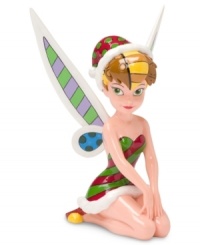 Just a little bit of pixie dust brings even more magic to the holiday season with this Tinkerbell figurine. From acclaimed Brazilian artist Romero Britto. Just a little bit of pixie dust brings even more magic to the holiday season with this Tinkerbell figurine. From acclaimed Brazilian artist Romero Britto.