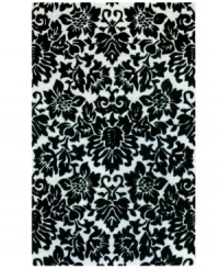 Toile tales. The St. Croix Structure area rug boasts a classic pattern in fresh fashion colors, featuring dimensional details that pop in black against a plain beige ground. Hand tufted in India by highly skilled weavers, this 100% wool rug looks great in any space and feels fantastic underfoot. Toile tales. The St. Croix Structure area rug boasts a classic pattern in fresh fashion colors, featuring dimensional details that pop in black against a plain beige ground. Hand tufted in India by highly skilled weavers, this 100% wool rug looks great in any space and feels fantastic underfoot.