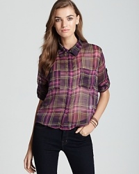 A feminine take on the classic plaid button down, this sheer Vintage Havana shirt features a chic and unexpected slit up the back and looks great layered over a clean white cami. A feminine take on the classic plaid button down, this sheer Vintage Havana shirt features a chic and unexpected slit up the back and looks great layered over a clean white cami.