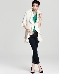 Decadently trimmed with a cascade of ruffles, this C by Bloomingdale's cardigan infuses your cashmere collection with a romantic spirit. Decadently trimmed with a cascade of ruffles, this C by Bloomingdale's cardigan infuses your cashmere collection with a romantic spirit.