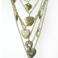 DaisyJewel Bouquet of Heart Pendants and Heart Locket Necklace: 8 Individual Pendants with One Locket Hang From Six Separate Link Chains Connected By One Lobster Clasp DaisyJewel Bouquet of Heart Pendants and Heart Locket Necklace: 8 Individual Pendants with One Locket Hang From Six Separate Link Chains Connected By One Lobster Clasp