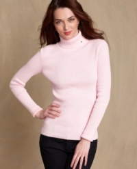 Kick up your wardrobe with Tommy Hilfiger's autumn-ready turtleneck. The ribbed knit design and embroidered flag logo elevate it into a must-have basic. Kick up your wardrobe with Tommy Hilfiger's autumn-ready turtleneck. The ribbed knit design and embroidered flag logo elevate it into a must-have basic.