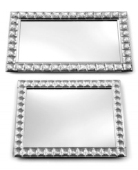 Your entire room will sparkle with the fabulous Mirrored tray, featuring reflective glass trimmed with faceted beads. Set it on top of a table or dresser to hold everything from drinks and snacks, to candles and cosmetics. Your entire room will sparkle with the fabulous Mirrored tray, featuring reflective glass trimmed with faceted beads. Set it on top of a table or dresser to hold everything from drinks and snacks, to candles and cosmetics.