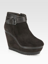 An adjustable leather strap tops this sky-high platform silhouette of rich suede. Suede-covered wedge, 4½ (115mm)Suede platform, 2 (50mm)Compares to a 2½ heel (65mm)Suede upper with leather trimSide zip and adjustable buckle strapLeather liningRubber solePadded insoleImported An adjustable leather strap tops this sky-high platform silhouette of rich suede. Suede-covered wedge, 4½ (115mm)Suede platform, 2 (50mm)Compares to a 2½ heel (65mm)Suede upper with leather trimSide zip and adjustable buckle strapLeather liningRubber solePadded insoleImported