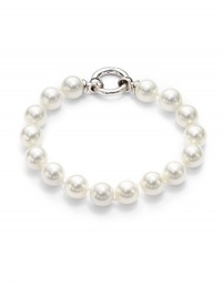 THE LOOKMother of pearl strandSterling silver rhodium-plated settingContinuous circle claspTHE MEASUREMENTLength, about 8ORIGINImported THE LOOKMother of pearl strandSterling silver rhodium-plated settingContinuous circle claspTHE MEASUREMENTLength, about 8ORIGINImported