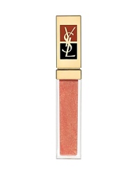 Yves Saint Laurent GOLDEN GLOSS Shimmering Lip Gloss is the ultimate in beauty luxury. This high shine lip gloss forms a mirror-effect on the lips with real 24 carat sparkling gold flecks. It also contains a complex of nourishing oils (Nigelle and Cameline Oils) which protect the lips while providing total comfort. It contains 0.2% of 24 carat gold. Yves Saint Laurent GOLDEN GLOSS Shimmering Lip Gloss is the ultimate in beauty luxury. This high shine lip gloss forms a mirror-effect on the lips with real 24 carat sparkling gold flecks. It also contains a complex of nourishing oils (Nigelle and Cameline Oils) which protect the lips while providing total comfort. It contains 0.2% of 24 carat gold.