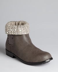 Add some sparkle to her step with these rhinestone studded cuffed booties from Stuart Weitzman. Add some sparkle to her step with these rhinestone studded cuffed booties from Stuart Weitzman.