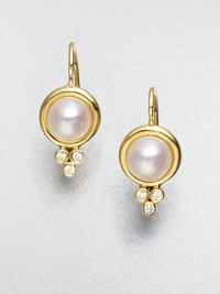 Luminous elegance in this diamond accented cultured pearl design in radiant 18k gold. Cultured pearls18k goldDiamonds, .09 tcwLength, about .8Hook backMade in Italy