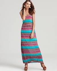 This boldly striped Michael Stars maxi dress embraces summer's favorite floor-sweeping silhouette. This boldly striped Michael Stars maxi dress embraces summer's favorite floor-sweeping silhouette.