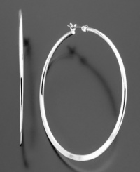 Take your look the extra mile with these trendy skinny silvertone mixed metal hoop earrings by Betsey Johnson. Approximate diameter: 2 inches. Approximate drop: 1 inch. Take your look the extra mile with these trendy skinny silvertone mixed metal hoop earrings by Betsey Johnson. Approximate diameter: 2 inches. Approximate drop: 1 inch.
