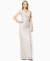 Exuding classic glamour in a floor-length column silhouette, Lauren Ralph Lauren's elegant sleeveless gown is designed in sleek metallic jersey for show-stopping appeal.