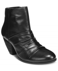 Ruching along the vamp of Vince Camuto's Handella booties makes this single-sole pair stand out. Rock them with your favorite pair of jeans or even a dress for a tough-girl look. Ruching along the vamp of Vince Camuto's Handella booties makes this single-sole pair stand out. Rock them with your favorite pair of jeans or even a dress for a tough-girl look.