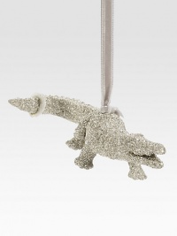 A glittery ornament for the discerning collector, carefully handcrafted in crocodile-shaped glass glitter with a satiny ribbon loop. Ribbon loop Glass glitter 3W X 6H X 1D Handmade in USA A glittery ornament for the discerning collector, carefully handcrafted in crocodile-shaped glass glitter with a satiny ribbon loop. Ribbon loop Glass glitter 3W X 6H X 1D Handmade in USA