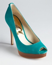 In color-rich aqua suede, these MICHAEL Michael Kors pumps lend fashion-forward style to the office and after hours. In color-rich aqua suede, these MICHAEL Michael Kors pumps lend fashion-forward style to the office and after hours.