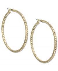 You can't go wrong with hoops! These Jones New York earrings flaunt a large design embellished with crystal glass accents. Crafted in worn gold tone mixed metal. Approximate diameter: 1-3/4 inches. You can't go wrong with hoops! These Jones New York earrings flaunt a large design embellished with crystal glass accents. Crafted in worn gold tone mixed metal. Approximate diameter: 1-3/4 inches.