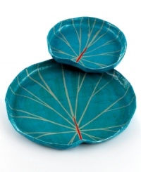 Unique and beautiful, Tea Leaf nesting trays recall Haiti's lush natural landscape in eco-friendly paper. A raised edge makes each well suited for holding jewelry, perfume bottles and other objects. Unique and beautiful, Tea Leaf nesting trays recall Haiti's lush natural landscape in eco-friendly paper. A raised edge makes each well suited for holding jewelry, perfume bottles and other objects.