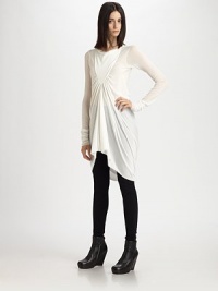 Sculptural and sleek, tailored with an artfully gathered front.BoatneckTriangular bib panelGathered frontExtra-long sleevesAsymmetrical hemlineBack drapeAbout 30 from natural waist70% rayon/15% nylon/15% cottonDry cleanMade in Italy of imported fabricModel shown is 5'11 (180cm) wearing US size 4. Sculptural and sleek, tailored with an artfully gathered front.BoatneckTriangular bib panelGathered frontExtra-long sleevesAsymmetrical hemlineBack drapeAbout 30 from natural waist70% rayon/15% nylon/15% cottonDry cleanMade in Italy of imported fabricModel shown is 5'11 (180cm) wearing US size 4.