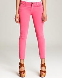 Cut a sleek silhouette in these luscious raspberry Sanctuary capri jeans--delicious with tees and tanks for a naturally sweet season. Cut a sleek silhouette in these luscious raspberry Sanctuary capri jeans--delicious with tees and tanks for a naturally sweet season.
