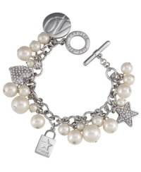 It's the magic of Macy's! Carolee combine's cute Macy's shopping bags with heart and star charms, clusters of glass pearls and crystal fireballs on this adorable charm bracelet. Setting and toggle clasp crafted in rhodium-plated mixed metal. Approximate length: 8 inches. It's the magic of Macy's! Carolee combine's cute Macy's shopping bags with heart and star charms, clusters of glass pearls and crystal fireballs on this adorable charm bracelet. Setting and toggle clasp crafted in rhodium-plated mixed metal. Approximate length: 8 inches.
