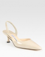 Glossy patent leather with a comfortable slingback and low-cut point toe. Self-covered heel, 2 (50mm)Patent leather upperLeather lining and solePadded insoleMade in Italy