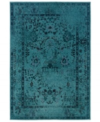 Distressed never looked so rich. The Revamp area rug from Sphinx takes a vintage-inspired damask motif and updates its heirloom appeal with modern, faded styling in vibrant turquoise. Created in the USA of ultra-tough, hard-twist polypropylene. Distressed never looked so rich. The Revamp area rug from Sphinx takes a vintage-inspired damask motif and updates its heirloom appeal with modern, faded styling in vibrant turquoise. Created in the USA of ultra-tough, hard-twist polypropylene.