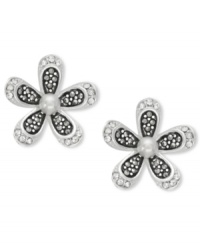 Petite petals bring any look to life. Genevieve & Grace's pretty stud earrings features glass pearls at the center (4 mm) and glittering marcasite at the edges. Set in sterling silver. Approximate diameter: 1 inch. Petite petals bring any look to life. Genevieve & Grace's pretty stud earrings features glass pearls at the center (4 mm) and glittering marcasite at the edges. Set in sterling silver. Approximate diameter: 1 inch.