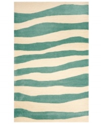Step across a luxurious ground of soft aqua waves and sand with this Wavey Stripe area rug from Liora Manne. Hand-tufted, ultra-durable and so easy to clean, it is UV light stabilized to resist fading, whether used indoors or out. Step across a luxurious ground of soft aqua waves and sand with this Wavey Stripe area rug from Liora Manne. Hand-tufted, ultra-durable and so easy to clean, it is UV light stabilized to resist fading, whether used indoors or out.