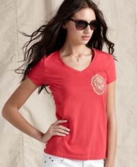 Join the cool crown in Tommy Hilfiger's V-neck logo tee, rendered in super-soft cotton. The solid front and striped back is so summery, too!