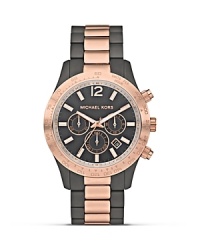 Be a good sport with two-tone watch from MICHAEL Michael Kors, boasting a bold dial and sleek bracelet. Designed for performance and style, it's the ultimate in athletic cool. Be a good sport with two-tone watch from MICHAEL Michael Kors, boasting a bold dial and sleek bracelet. Designed for performance and style, it's the ultimate in athletic cool.