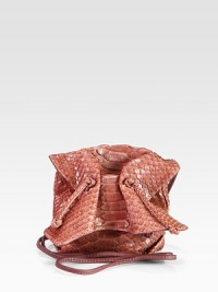 A gorgeous shrunken silhouette in rich dyed python with contrast lining.Shoulder strap, 28 dropMagnetic closureFully lined5W X 5H X 2DMade in USA A gorgeous shrunken silhouette in rich dyed python with contrast lining.Shoulder strap, 28 dropMagnetic closureFully lined5W X 5H X 2DMade in USA