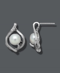 Class, sophistication, and subtlety. These dainty stud earrings feature a cultured freshwater pearl (8-9 mm) cradled in a diamond-accented sterling silver teardrop. Approximate diameter: 3/4 inch.