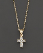 A heavenly diamond cross pendant in 14 Kt. yellow gold, with rope chain.